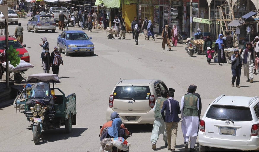 240518 -- BAMYAN, May 18, 2024 -- This photo taken on May 18, 2024 shows a local market near the scene of a shooting attack that killed three Spanish nationals on the previous day in Bamyan City, cent ...