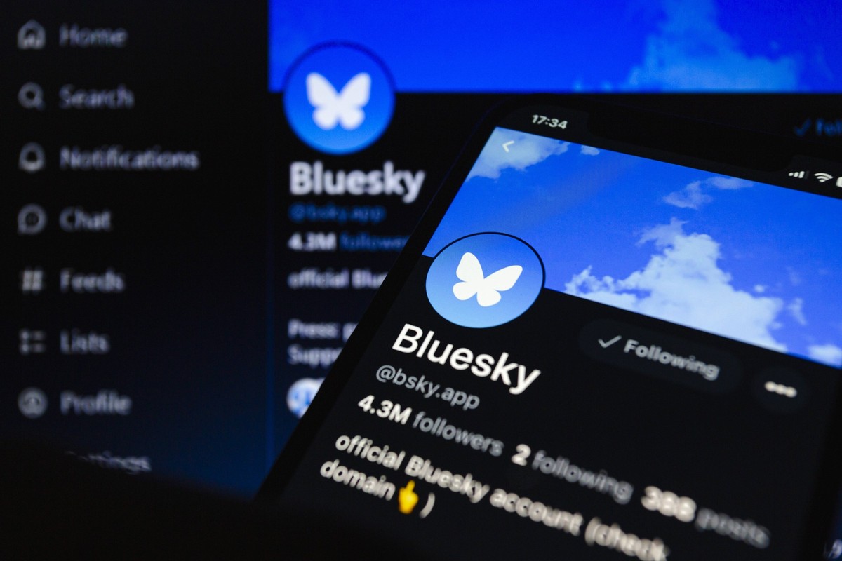 September 11, 2024, Asuncion, Paraguay: Bluesky s official account is displayed on its app on iPhone and laptop. Bluesky launched video sharing. Users can share one video per post, up to 60 seconds lo ...