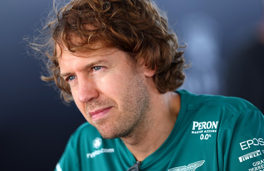 MONTREAL, QUEBEC - JUNE 17: Sebastian Vettel of Germany and Aston Martin F1 Team talks to the media in the Paddock prior to practice ahead of the F1 Grand Prix of Canada at Circuit Gilles Villeneuve o ...