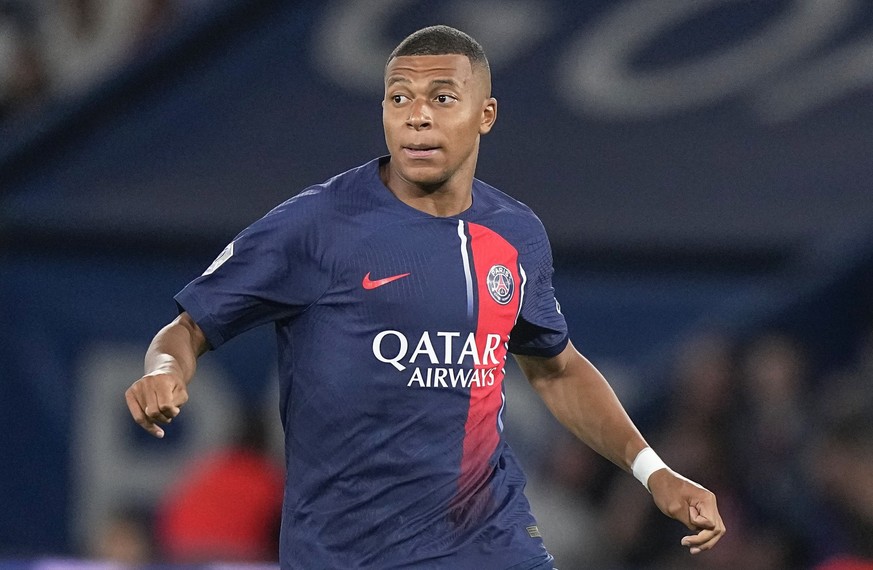 FILE - PSG&#039;s Kylian Mbappe looks on during the French League One soccer match between Paris Saint-Germain and Lens at the Parc des Princes stadium in Paris, Saturday, Aug. 26, 2023. Mbappe has to ...