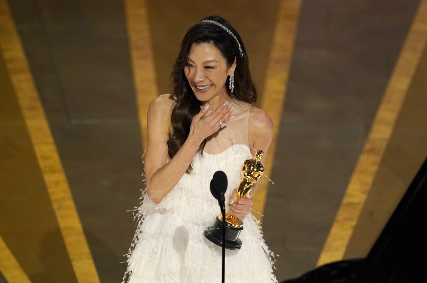 Michelle Yeoh accepts the award for best performance by an actress in a leading role for &quot;Everything Everywhere All at Once&quot; at the Oscars on Sunday, March 12, 2023, at the Dolby Theatre in  ...