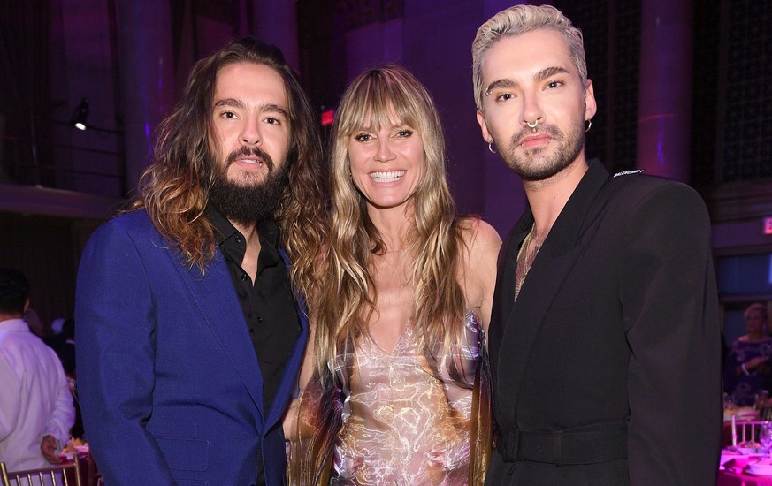NEW YORK, NEW YORK - OCTOBER 28: (L-R) Tom Kaulitz, Heidi Klum and Bill Kaulitz attend the Angel Ball 2019 hosted by Gabrielle&#039;s Angel Foundation at Cipriani Wall Street on October 28, 2019 in Ne ...
