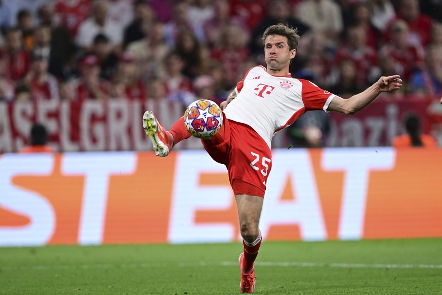 Bayern&#039;s Thomas Mueller controls the ball during the Champions League semifinal first leg soccer match between Bayern Munich and Real Madrid at the Allianz Arena in Munich, Germany, Tuesday, Apri ...