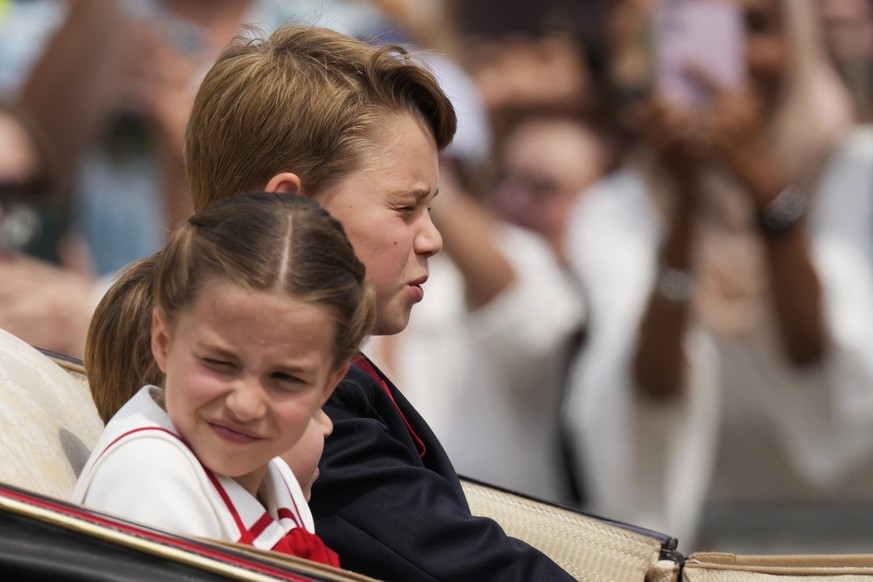 From right: Prince George, Prince Louis and Princess Charlotte return to Buckingham Palace after the Trooping The Colour parade, in London, Saturday, June 17, 2023. Trooping the Colour is the King&#03 ...