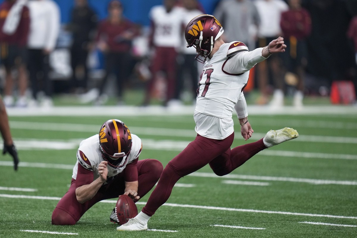 FILE - Washington Commanders place-kicker Zane Gonzalez (47) kicks a 47-yard field goal against the Detroit Lions during the first half of an NFL football divisional playoff game, Saturday, Jan. 18, 2 ...