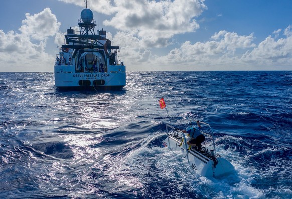 The submarine DSV Limiting Factor floats near the research vessel DSSV Pressure Drop above the Pacific Ocean&#039;s Mariana Trench in an undated photo released by the Discovery Channel May 13, 2019. A ...