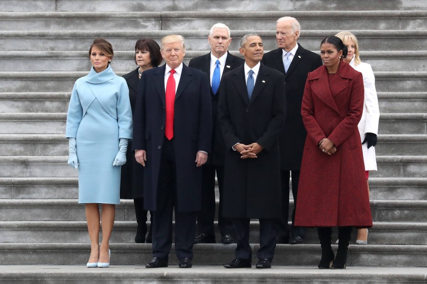 (From L to R) First Lady Melania Trump, Karen Pence, President Donald Trump, Vice President Mike Pence, former president Barack Obama, former vice president Joe Biden, Michelle Obama and Jill Biden st ...