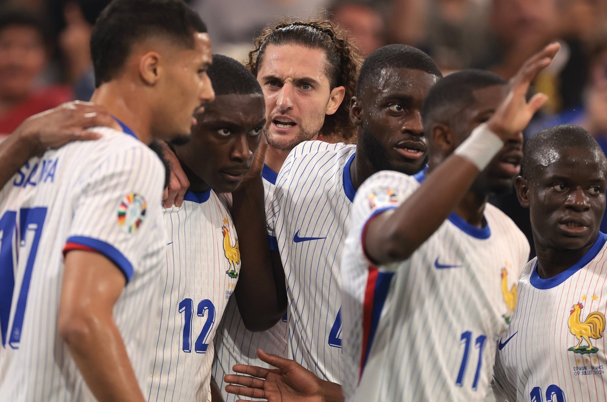 Munich, Germany, 9th July 2024. Randal Kolo Muani of France celebrates with team mates after scoring to give the side a 1-0 lead during the UEFA European Championships semi final match at Allianz Aren ...