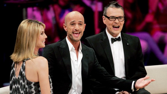 Die Jurymitglieder von &quot;Germany?s next Topmodel&quot;, Model und Moderatorin Heidi Klum, Peyman Amin (M) und Rolf Scheider sind am Donnerstag (21.05.2009) in der Lanxess-Arena in Köln beim Finale ...