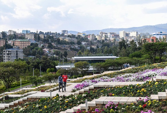 240318 -- ADDIS ABABA, March 18, 2024 -- People walk at the Friendship Square in Addis Ababa, Ethiopia, Feb. 18, 2024. In Addis Ababa, the capital of Ethiopia, the Friendship Square stands as a popula ...