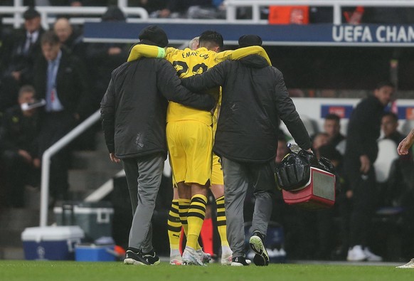 . - Newcastle United v Borussia Dortmund, UEFA Champions League, Group F, St Jamess Park Stadium, Newcastle, UK. - 25th October 2023. Emre Can of Borussia Dortmund looks in pain and is substituted off ...