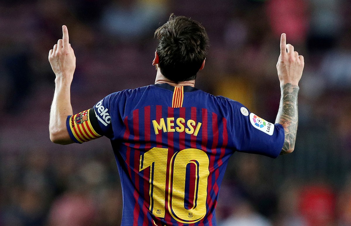 FILE PHOTO: Soccer Football - La Liga Santander - FC Barcelona v Alaves - Camp Nou, Barcelona, Spain - August 18, 2018 Barcelona's Lionel Messi celebrates scoring their third goal REUTERS/Albert ...