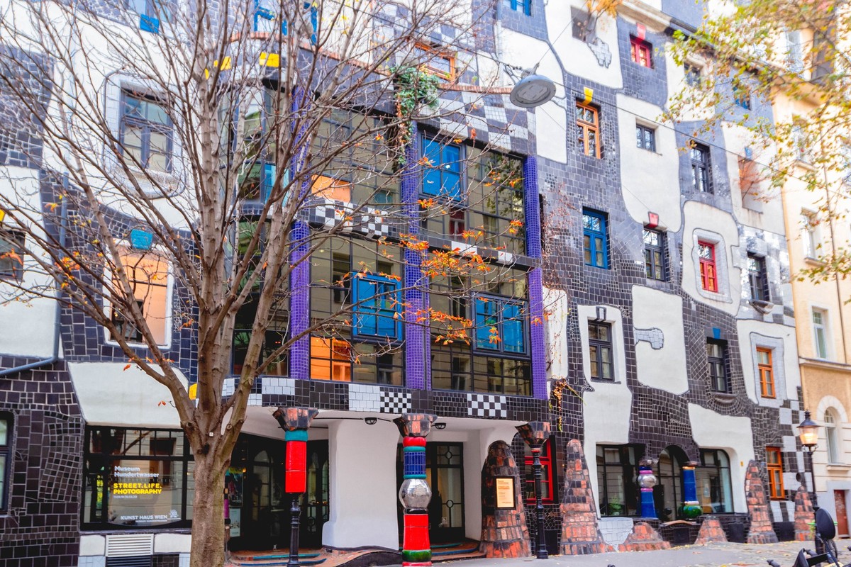 VIENNA, AUSTRIA - NOVEMBER 16, 2019: Vienna Hundertwasser Museum, beautiful colorful house with unusual walls and windows, Vienna, Austria