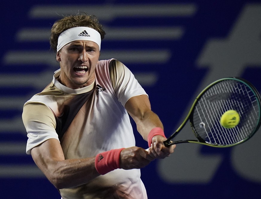 Alexander Zverev of Germany returns a ball during a match against to Jenson Brooksby of the U.S. at the Mexican Open tennis tournament in Acapulco, Mexico, Tuesday, Feb. 22, 2022. (AP Photo/Eduardo Ve ...