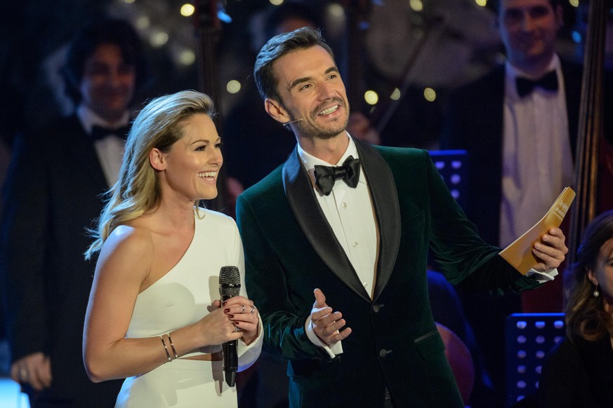 SUHL, GERMANY - NOVEMBER 26: Helene Fischer and Florian Silbereisen are seen on stage during the tv show &#039;Das Adventsfest der 100.000 Lichter&#039; on November 26, 2016 in Suhl, Germany. (Photo b ...