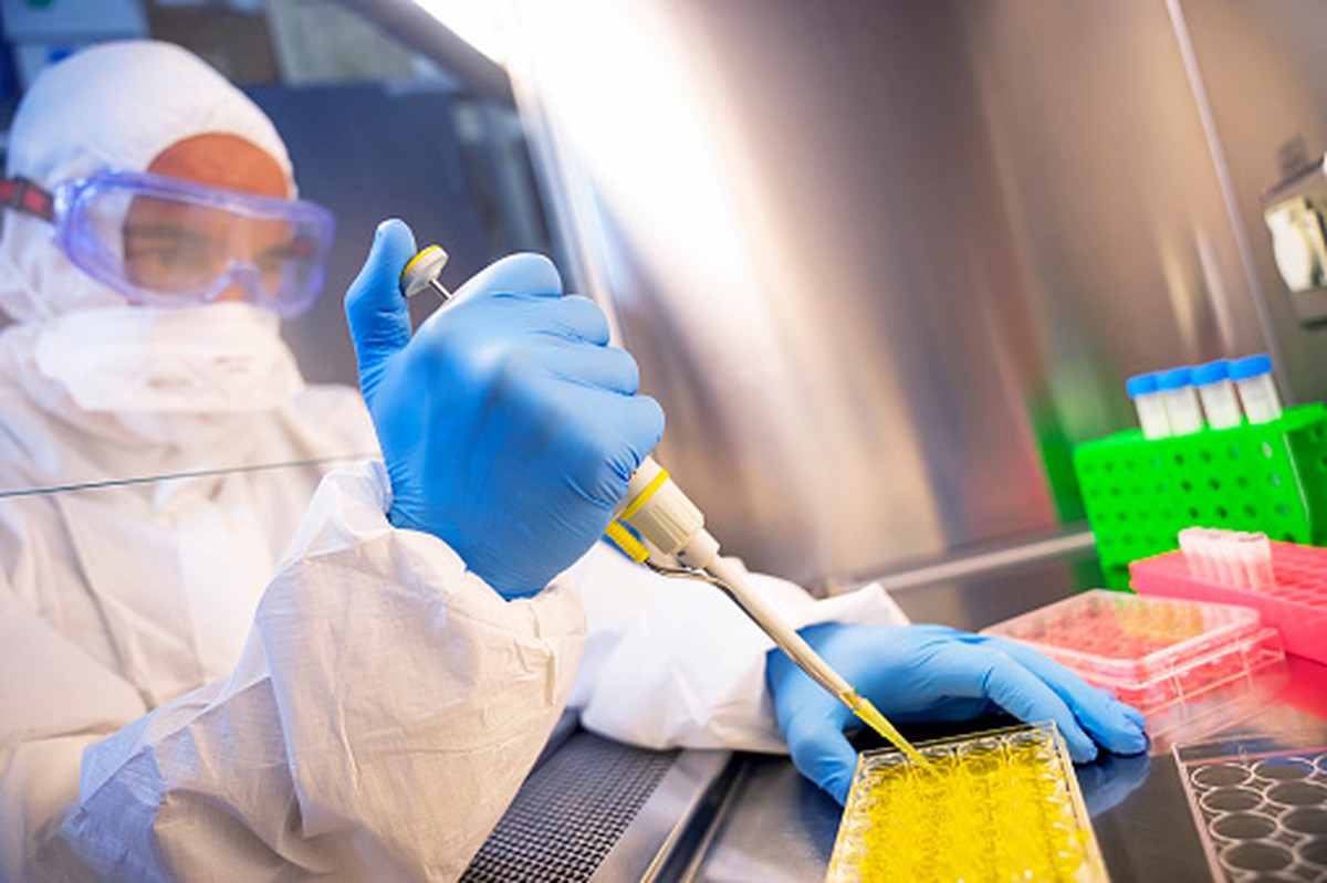 Coronavirus 2019-nCoV theme. Tired and sick doctor is finding cure for corona virus
