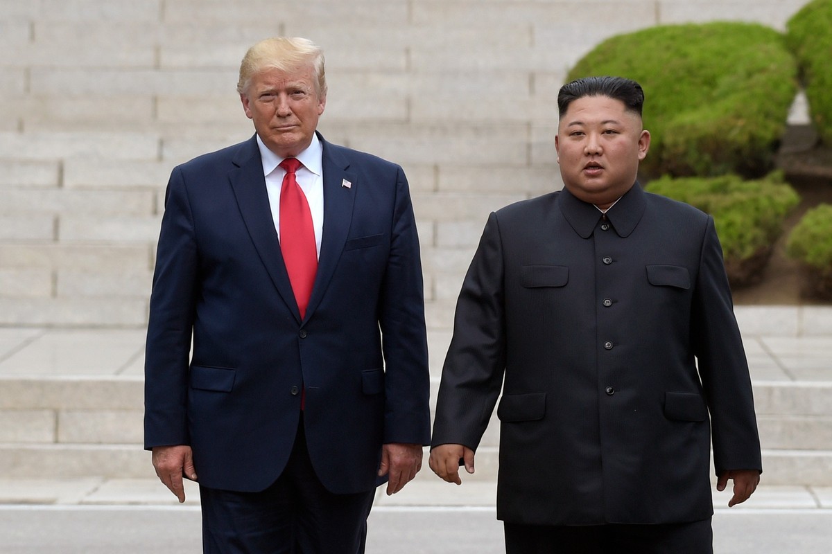 FILE - Then U.S. President Donald Trump, left, meets with North Korean leader Kim Jong Un at the North Korean side of the border at the village of Panmunjom in Demilitarized Zone, on June 30, 2019. (A ...