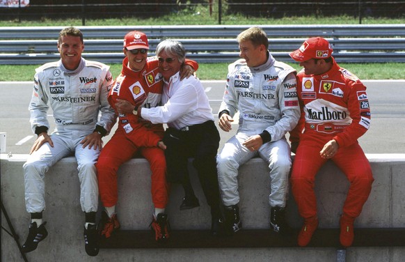 David Coulthard (v.l.), Michael Schumacher, Bernie Ecclestone, Mika Häkkinen und Rubens Barrichello 