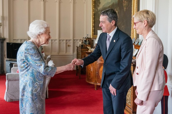 Audiences at Windsor Castle. Queen Elizabeth II receives the President of Switzerland Ignazio Cassis and his wife Paola Cassis during an audience at Windsor Castle. Picture date: Thursday April 28, 20 ...