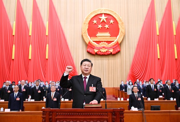 230310 -- BEIJING, March 10, 2023 -- Xi Jinping, newly elected president of the People s Republic of China PRC and chairman of the Central Military Commission of the PRC, makes a public pledge of alle ...