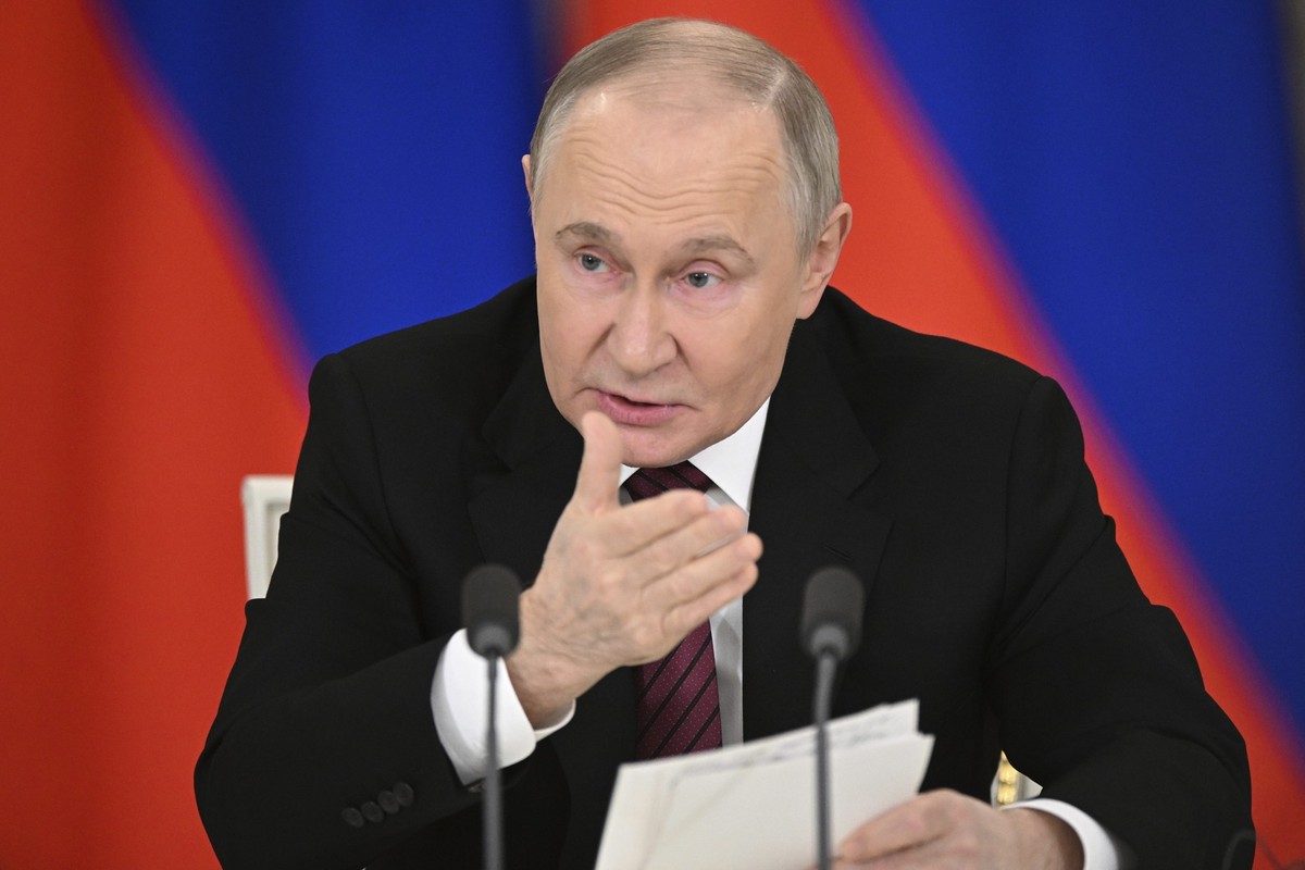 Russian President Vladimir Putin gestures as he speaks to journalists in the Grand Palace at the Kremlin in Moscow, Russia, Sunday, May 11, 2025, after celebrations of the 80th anniversary of the Sovi ...