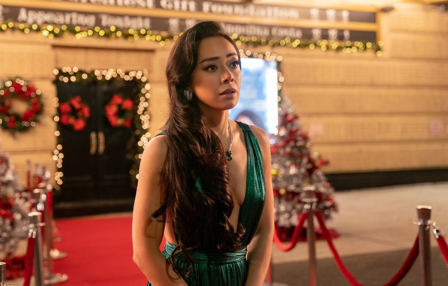 Christmas With You. Aimee Garcia as Angelina in Christmas With You. Cr. Jessica Kourkounis/Netflix © 2022.