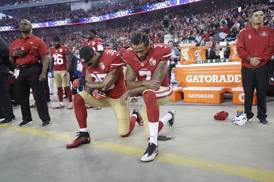 FILE - In this Sept. 12, 2016, file photo, San Francisco 49ers safety Eric Reid (35) and quarterback Colin Kaepernick (7) kneel during the national anthem before an NFL football game against the Los A ...