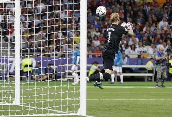 Liverpool goalkeeper Loris Karius can&#039;t stop the ball shot by Real Madrid&#039;s Gareth Bale during the Champions League Final soccer match between Real Madrid and Liverpool at the Olimpiyskiy St ...