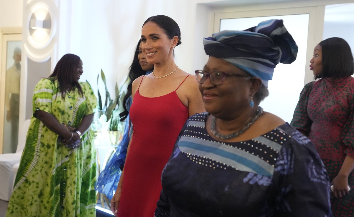 Meghan, the Duchess of Sussex, left, walks alongside Ngozi Okonjo-Iweala, right, Director-General of the World Trade Organization, during an event in Abuja, Nigeria, Saturday, May 11, 2024. Meghan, th ...