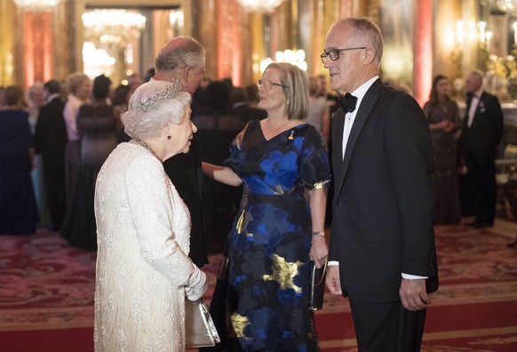 Britain's Queen Elizabeth II and Prince Charles greet Australia's Prime Minister Malcolm Turnbull and his wife Lucy in the Blue Drawing Room at Buckingham Palace as the Queen hosts a dinner during the ...