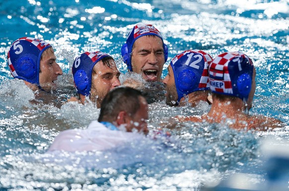 July 29, 2017 - Budapest, Hungary - Players of Croatia celebrate victory during the Men s Waterpolo Final between Hungary and Croatia on day sixteen of the Budapest 2017 FINA World Championships on Ju ...