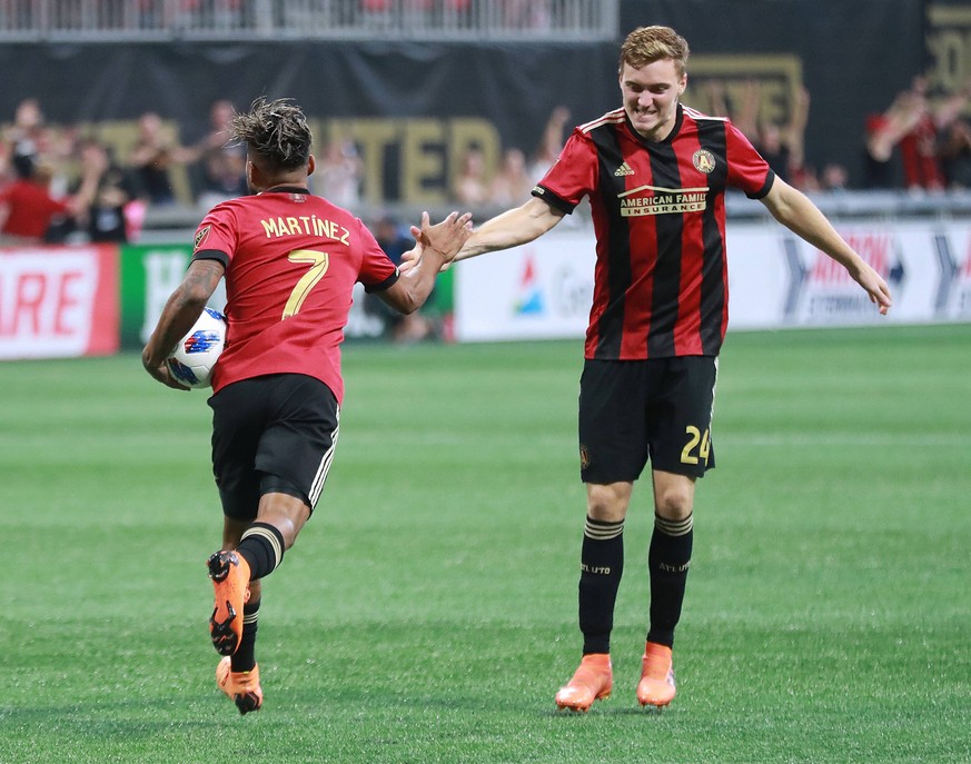 July 15, 2018 - Atlanta, GA, USA - Atlanta United midfielder Josef Martinez gets five from Julian Gressel after scoring a goal against the Seattle Sounders to tie the game 1-1 during the second half o ...