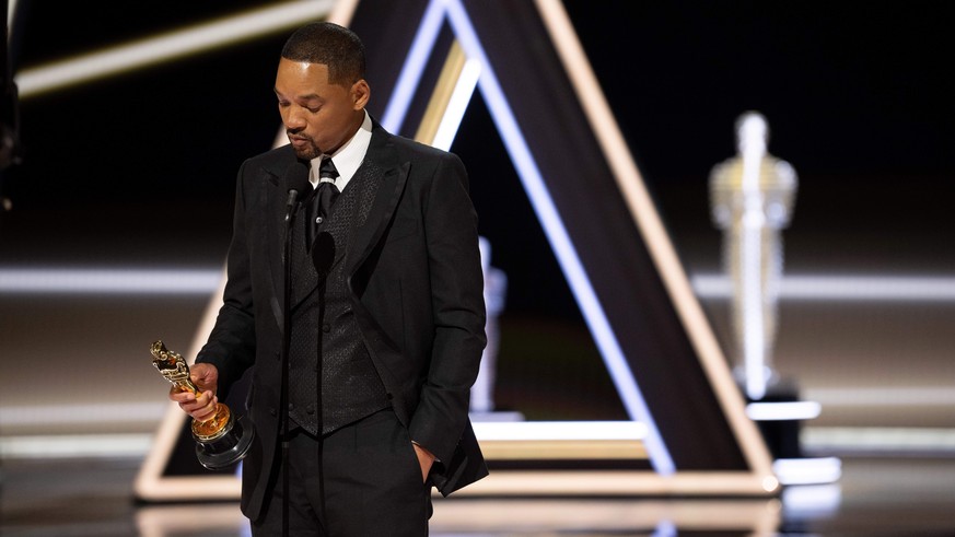 March 27, 2022, Hollywood, California, USA: WILL SMITH accepts the Oscar for Actor in a Leading Role during the live ABC telecast of the 94th Oscars at the Dolby Theatre. Earlier in the show, Smith to ...