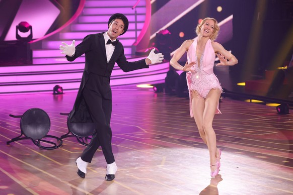 COLOGNE, GERMANY - MAY 13: René Casselly and Kathrin Menzinger perform on stage during the 11th show of the 15th season of the television competition show &quot;Let&#039;s Dance&quot; at MMC Studios o ...