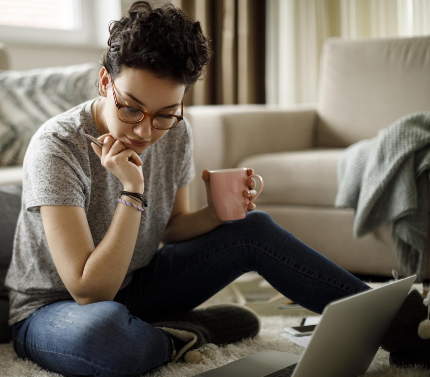 Young woman working at home