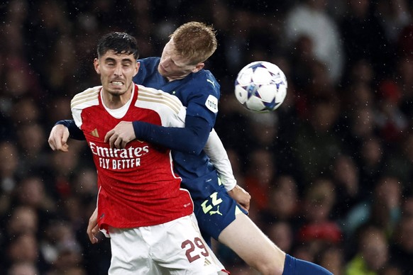 LONDON - l-r Kai Havertz of Arsenal FC, Jerdy Schouten of PSV during the UEFA Champions League match between Arsenal FC and PSV Eindhoven at the Emirates Stadium on September 20, 2023 in London, Unite ...
