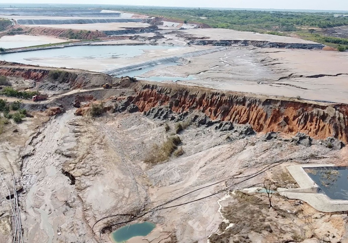 This image taken from video Wednesday, Feb. 19, 2025, shows a breach at a tailing dam at a Sino-Metals Leach Zambia mine near Kitwe. (AP Photo/Richard Kille )