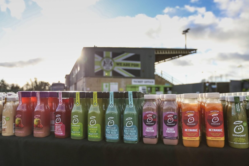 Forest Green Rovers v Cambridge United EFL Sky Bet League 2 12/12/2020. Innocent Smoothie drinks laid out to give away to supporters during the EFL Sky Bet League 2 match between Forest Green Rovers a ...