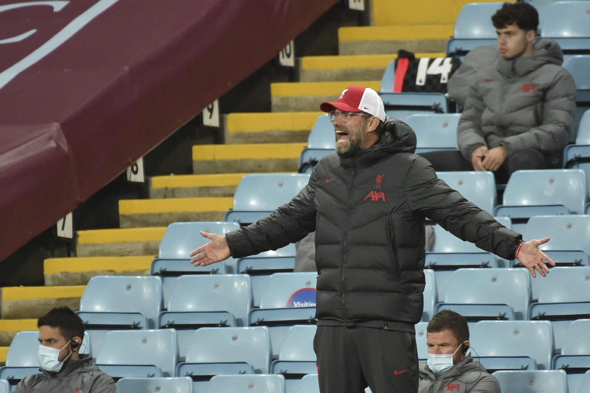 Liverpool's manager Jurgen Klopp shouts out from the touchline during the English Premier League soccer match between Aston Villa and Liverpool at the Villa Park stadium in Birmingham, England, S ...