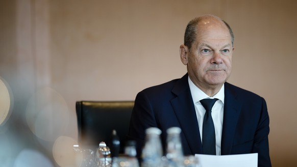 German Chancellor Olaf Scholz leads the cabinet meeting of the German government at the chancellery in Berlin, Germany, Wednesday, June 7, 2023. (AP Photo/Markus Schreiber)