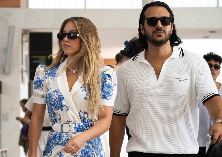 Sydney Sweeney and her fiancÃ Jonathan Davino arrive at the 81st Venice International Film Festival, the Mostra Sydney Sweeney and her fiancÃ Jonathan Davino arrive at the 81st Venice International Fi ...