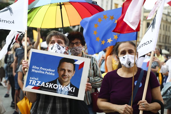 Supporters of Rafal Trzaskowski and other opposition prodemocracy candidates attend a protest &#039;A Change Is Coming&#039; against the presidency of Andrzej Duda who is running for re-election. Krak ...