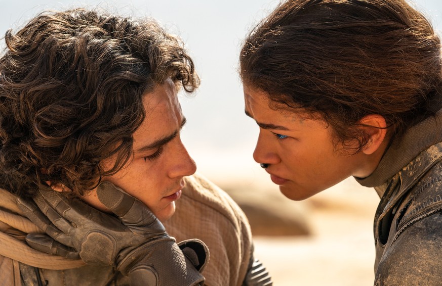 This image released by Warner Bros. Pictures shows Timothee Chalamet, left, and Zendaya in a scene from &quot;Dune: Part Two.&quot; (Niko Tavernise/Warner Bros. Pictures via AP)