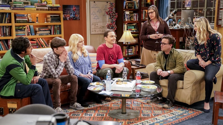 This image released by CBS shows Kunal Nayyar, from left, Simon Helberg, Melissa Rauch, Jim Parsons, Mayim Bialik, Johnny Galecki and Kaley Cuoco appear in a scene from the long-running comedy series  ...