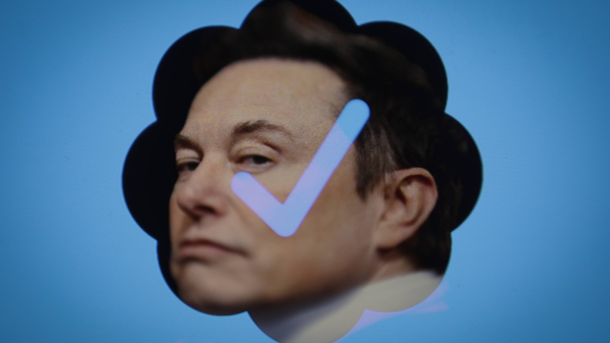 Twitter Introduces New Official Badge For Users For Free Twitter owner Elon Musk is seen with the Twitter blue authentication badge in this photo illustration in Warsaw, Poland on 21 September, 2022. ...