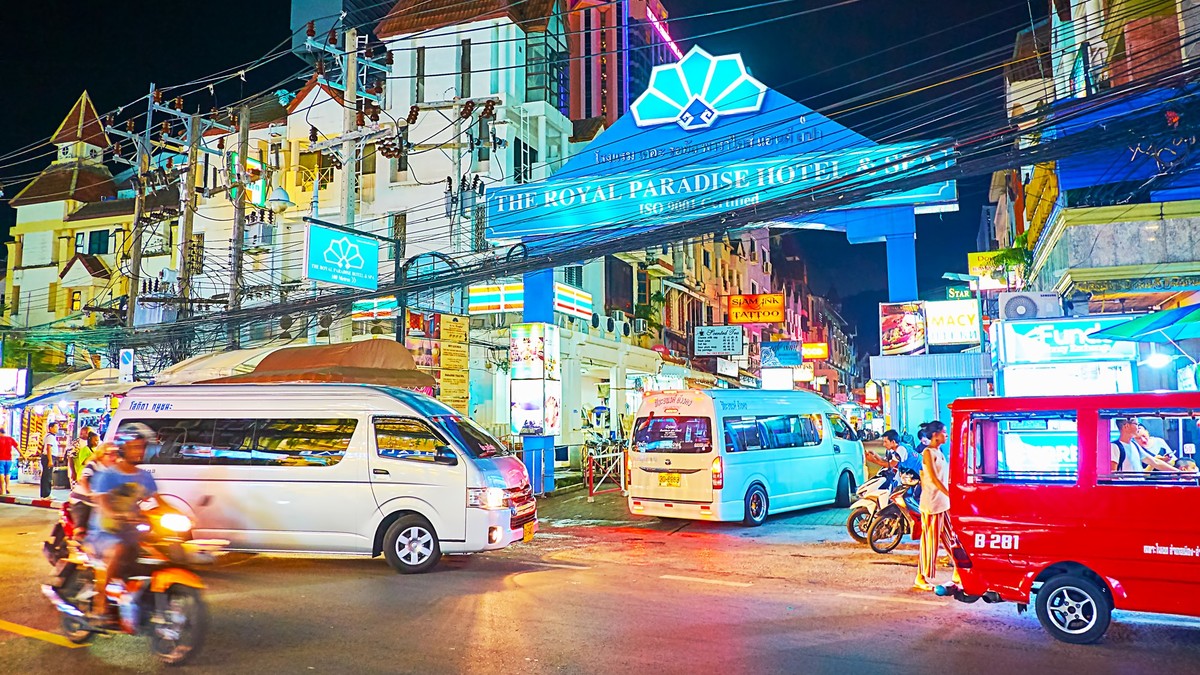 PATONG, THAILAND - MAY 1, 2019: The evening urban scene with heavy traffic in tourist Kathu district, on May 1 in Patong xkwx Patong beach, Phuket, Thailand, alcohol, architecture, attraction, bazaar, ...