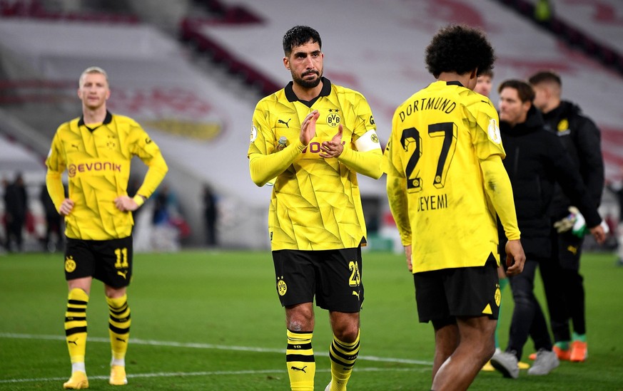 Fussball DFB Pokal 2023/2024 Achtelfinale 06.12.2023 VfB Stuttgart - Borussia Dortmund v. li., Enttaeuschung nach der Niederlage, Emre Can, Karim Adeyemi Borussia Dortmund *** Football DFB Cup 2023 20 ...