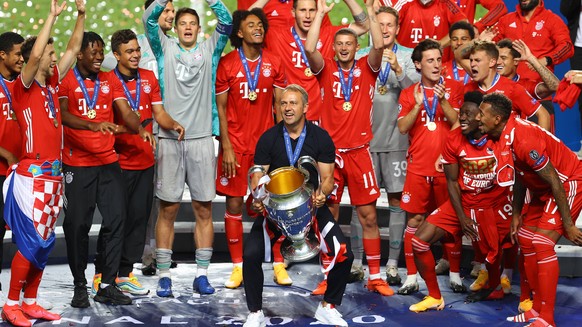 FOOTBALL : Paris Saint Germain vs Bayern Munich - Finale - UEFA Ligue des Champions - 23/08/2020 LISBON, PORTUGAL - AUGUST 23: Hans-Dieter Flick, Head Coach of FC Bayern Munich lifts the Champions Lea ...