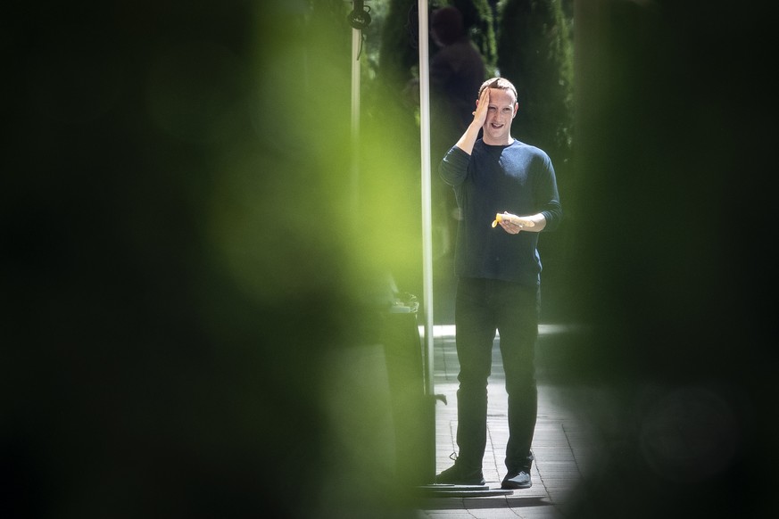 SUN VALLEY, ID - JULY 12: Mark Zuckerberg, chief executive officer of Facebook, applies sunscreen at the annual Allen &amp; Company Sun Valley Conference, July 12, 2019 in Sun Valley, Idaho. Every Jul ...