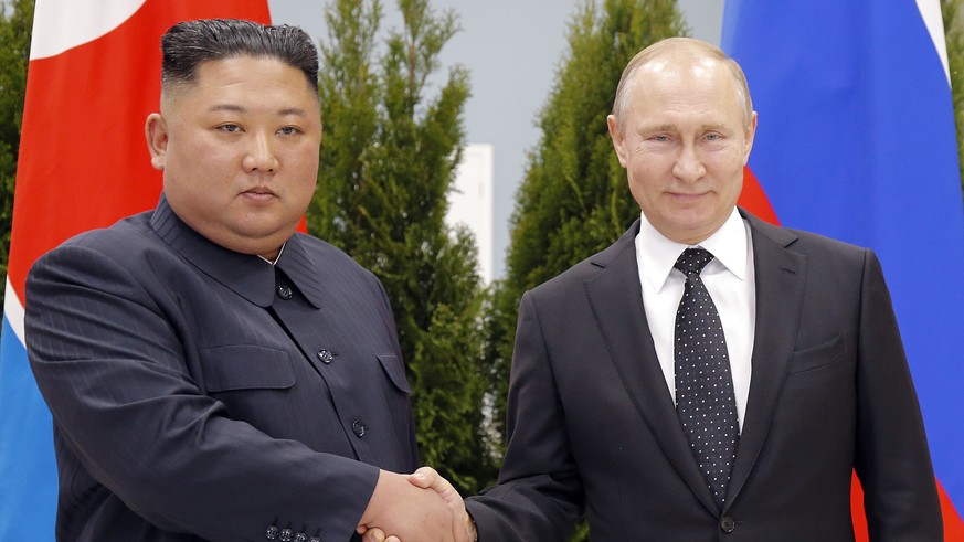 Russian President Vladimir Putin, right, and North Korea&#039;s leader Kim Jong Un shake hands during their meeting in Vladivostok, Russia, Thursday, April 25, 2019. Putin opened his talks with Kim, s ...